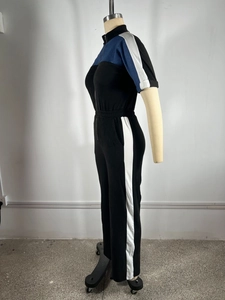 Detail of color-block jumpsuits with blue and white accents and side stripes