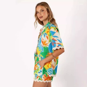 Women's two-piece tropical print summer set with scalloped hem shirt and matching shorts