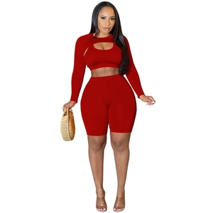 Women's red 3-piece sports set with cropped long sleeve shrug, vest and high waist shorts