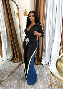 Women's 2-piece set with black zip jacket and color-blocked wide-leg pants detail