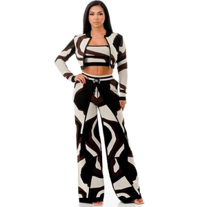 Three-piece women's knit set with camouflage zip-up jacket, crop top, and wide-leg pants