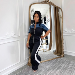 Women sporty colorblock jumpsuit with short sleeves and front zipper in blue and black