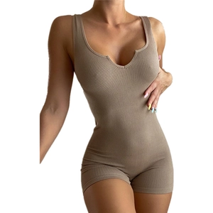Close-up of khaki knitted ribbed bodysuit featuring a deep U-neck and slim fit texture
