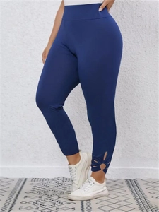 Pantaloni skinny elasticizzati blu scuro da donna a vita alta con tagli a petalo alle caviglie