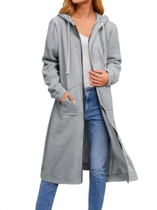 Detailed view of women's long grey zip-up hoodie featuring pockets and adjustable drawstrings