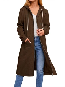 Detail of dark brown longline hoodie with drawstring hood and front zip closure