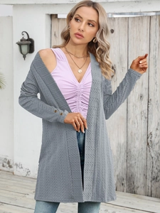 Close-up of gray long-sleeve knit cardigan featuring premium textured wave pattern fabric