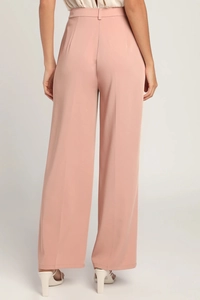 Detail of dusky pink high-waisted wide-leg trousers with smooth texture and clean rear cut