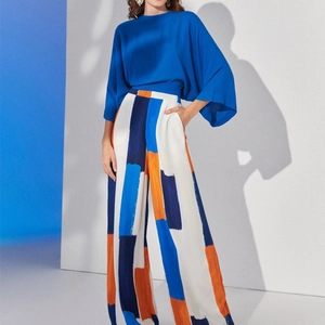 Women's chic royal blue satin top and high-waisted geometric print wide-leg pants set