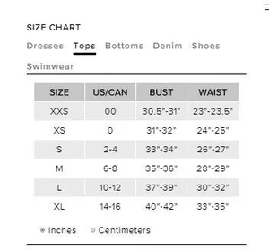 Detailed size chart for women's tops with US/CAN conversions in inches and cm