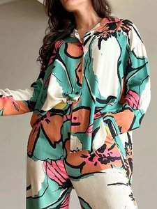 Women's 2-piece set with long sleeve floral print shirt and matching wide leg trousers