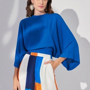 Women's royal blue satin top and artistic wide-leg pants set with high-waisted design