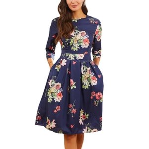 Elegant navy A-line floral midi dress with 3/4 sleeves and pockets in vintage style