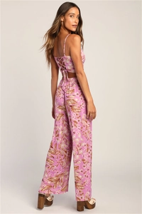 Detailed back view of a floral crop top with cross-tie design and wide-leg trousers