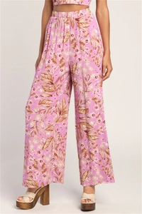 Detail of high-waisted floral wide-leg pants and matching crop top in pink chiffon fabric