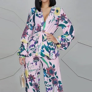 Women's floral print V-neck peplum top and wide leg pants two-piece set in pink