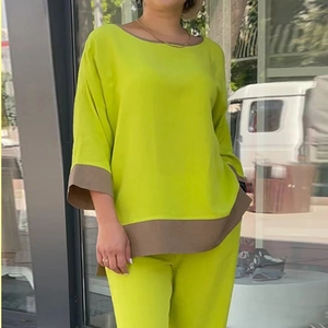 Women casual two-piece set with green round neck top and straight trousers