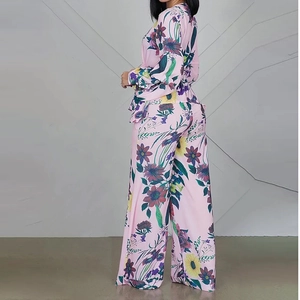 Floral two-piece set with V-neck puff sleeve top and high-waist wide-leg pants