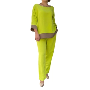 Women's two-piece lime green leisure set with round neck top and straight leg pants