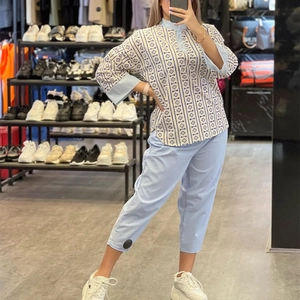 Women's light blue cotton linen set with geometric print top and cropped trousers