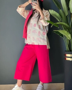 Detailed shot of cotton linen shirt with floral print and wide leg pants set
