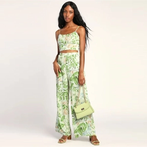 Chic two-piece floral set with crop camisole top and high-waist wide-leg pants in green