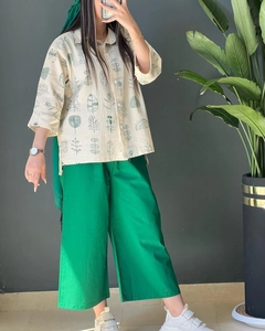 Chic two-piece cotton linen set featuring a leaf print shirt and green wide-leg pants