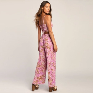 Floral print two-piece set featuring backless lace-up camisole and high-waisted wide-leg trousers