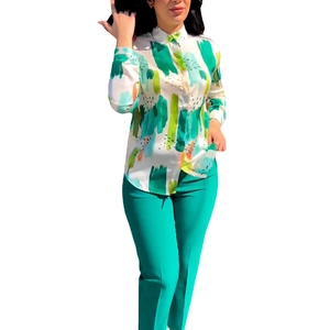 Women's two-piece fashion set with abstract print satin shirt and peacock green trousers