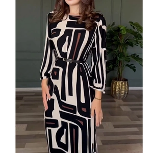 Elegant long sleeve geometric pattern dress with black waist belt and round neckline