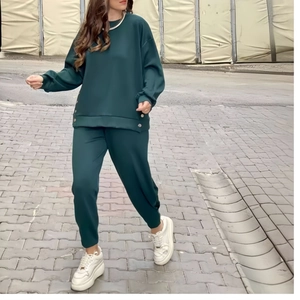 Women's dark green two-piece tracksuit set with long sleeve button top and casual pants