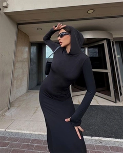 Detail of slim fit hooded maxi dress in premium black knit fabric on model