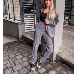 Women's 2-piece grey corduroy set featuring long sleeve shirt and matching joggers