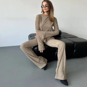 Oatmeal ribbed knit two-piece set featuring long sleeve top and high waist flared trousers