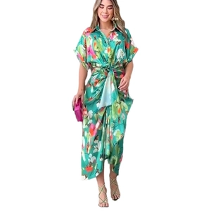 Floral print maxi shirt dress with lapel collar and irregular hem in emerald green