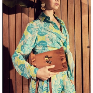 Chic caramel brown handbag with cherry motif and ruffled trim for elegant women