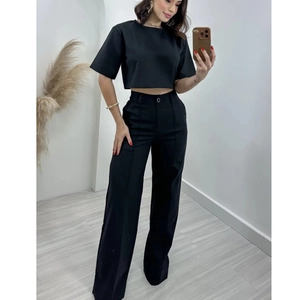 Women's chic black cotton linen set featuring crop top and high waist wide leg pants
