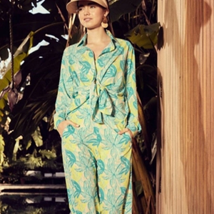 Women's floral print two-piece set featuring long sleeve shirt and wide-leg trousers