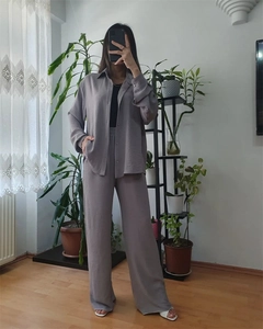 Detailed texture of mauve long sleeve shirt and wide leg trousers two-piece set