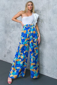 Detail of floral print wide-leg trousers with drawstring waist and ruffle shoulder top