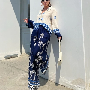 Women's 2-piece printed set with long sleeve shirt and wide leg pants in navy floral