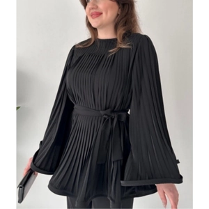 Women's black pleated long sleeve blouse with bell sleeves and waist tie detail