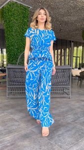 Detail of royal blue floral set with waist tie top and wide leg pants for summer