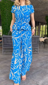 Detail of royal blue summer two-piece set featuring leaf prints and drawstring waist design