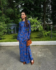 Detail showing royal blue floral print texture and premium fabric of long sleeve dress