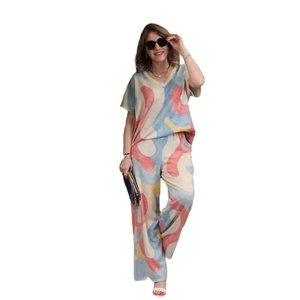 Women's 2-piece set with V-neck short sleeve top and wide leg pants in abstract color print
