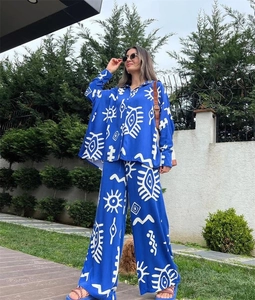 Detailed pattern of blue and white boho printed shirt and wide-leg trousers set