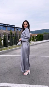 Chic satin two-piece set featuring grey long-sleeve shirt and matching maxi skirt outfit