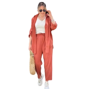 Women's chic brick red two-piece lounge set with long sleeve shirt and wide leg trousers