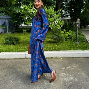 Elegant navy blue maxi dress with orange floral print and cinched waist for women